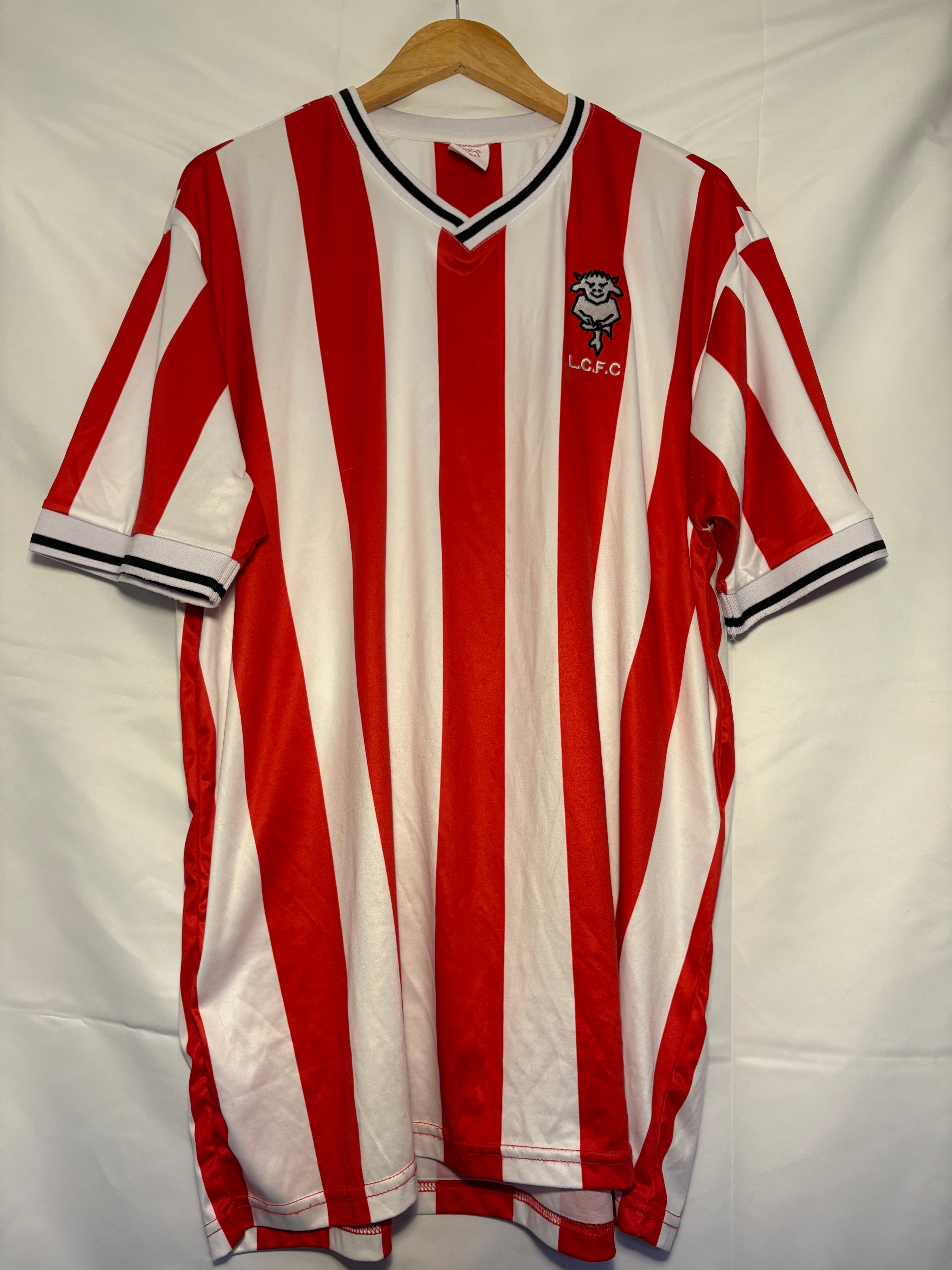 2020 remake of this Lincoln City FC 1987/88 retro shirt (used size 2XL)